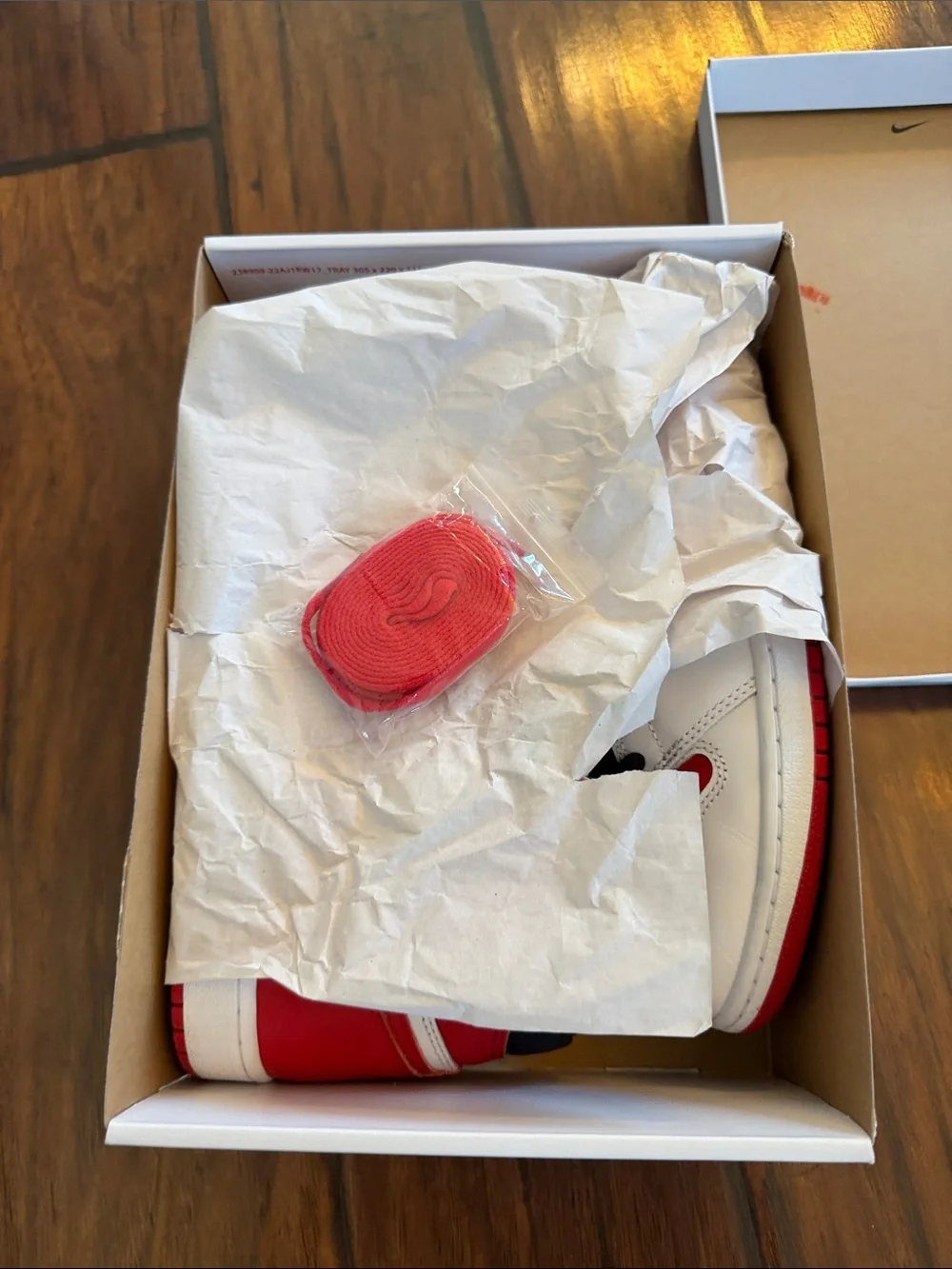 Air Jordan1 Retro High OG Sneakers in White, Red and Black